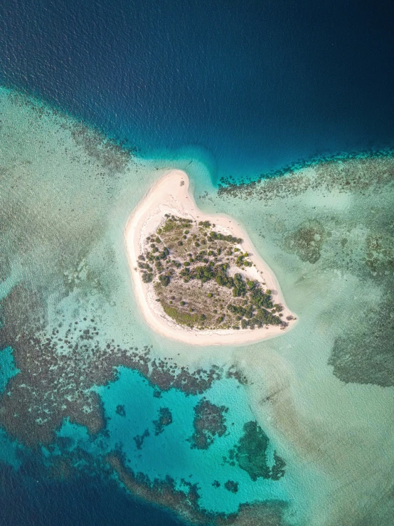 a tiny island in the middle of some water