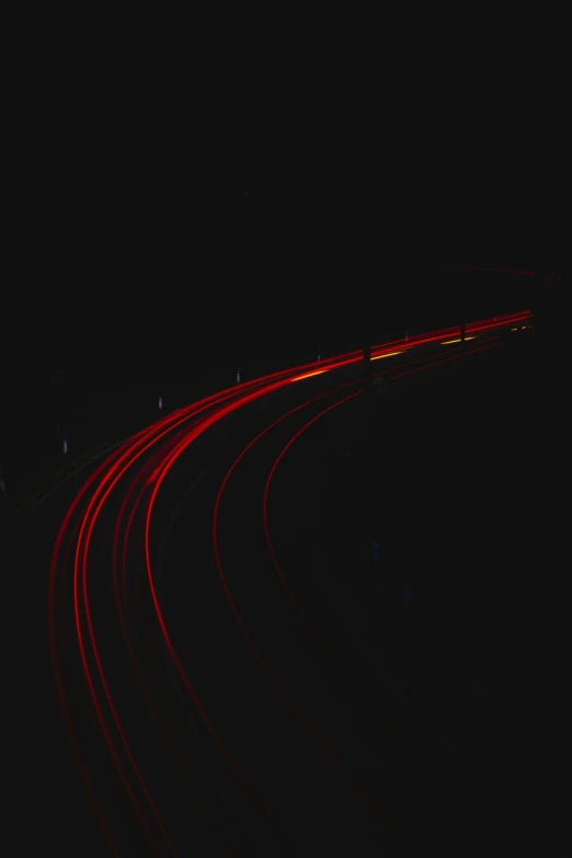 red lights on the side of a train track