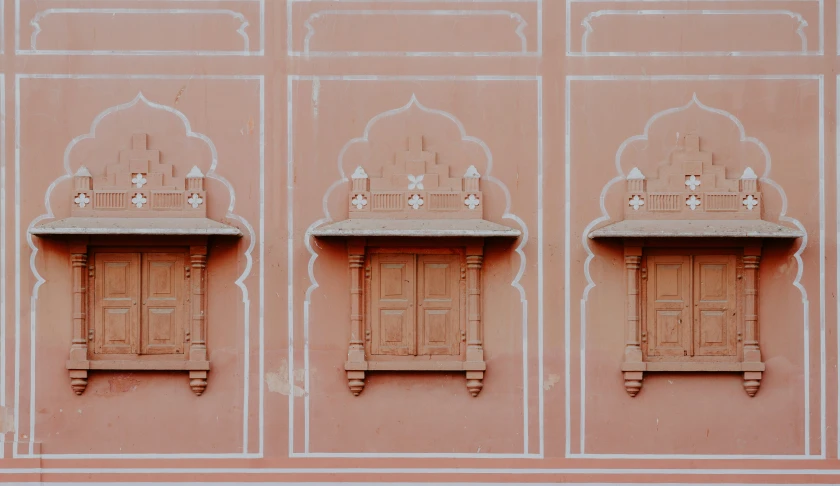 window frame and architecture of a pink building