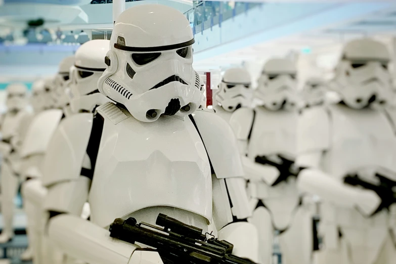 many star wars costumes are shown with guns
