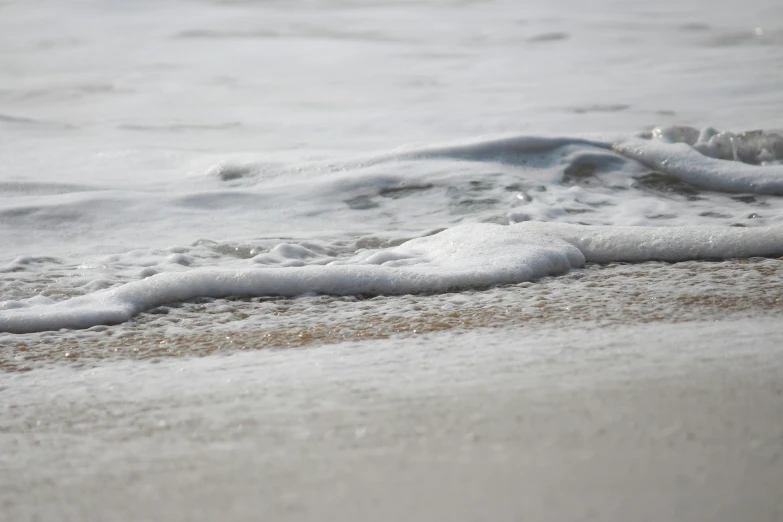 the water is foamy and so it looks like it is rolling down