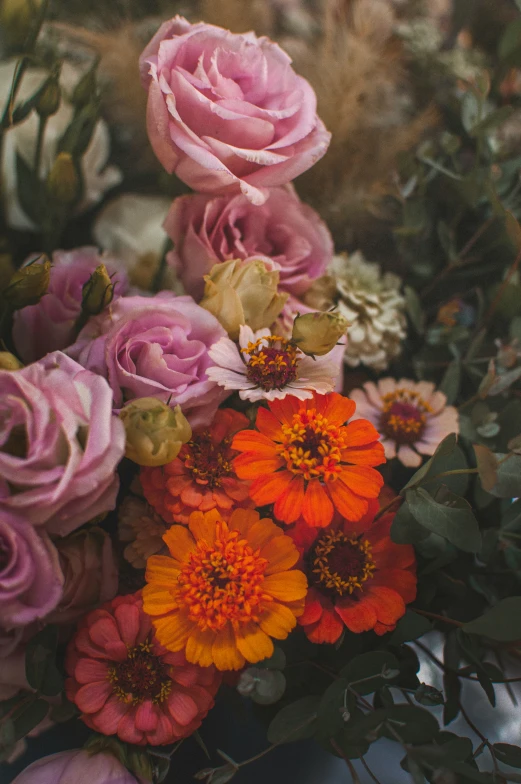 a vase that has a bunch of flowers in it