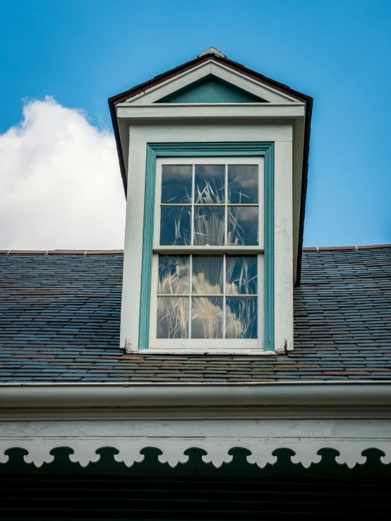 a window on the roof of a house