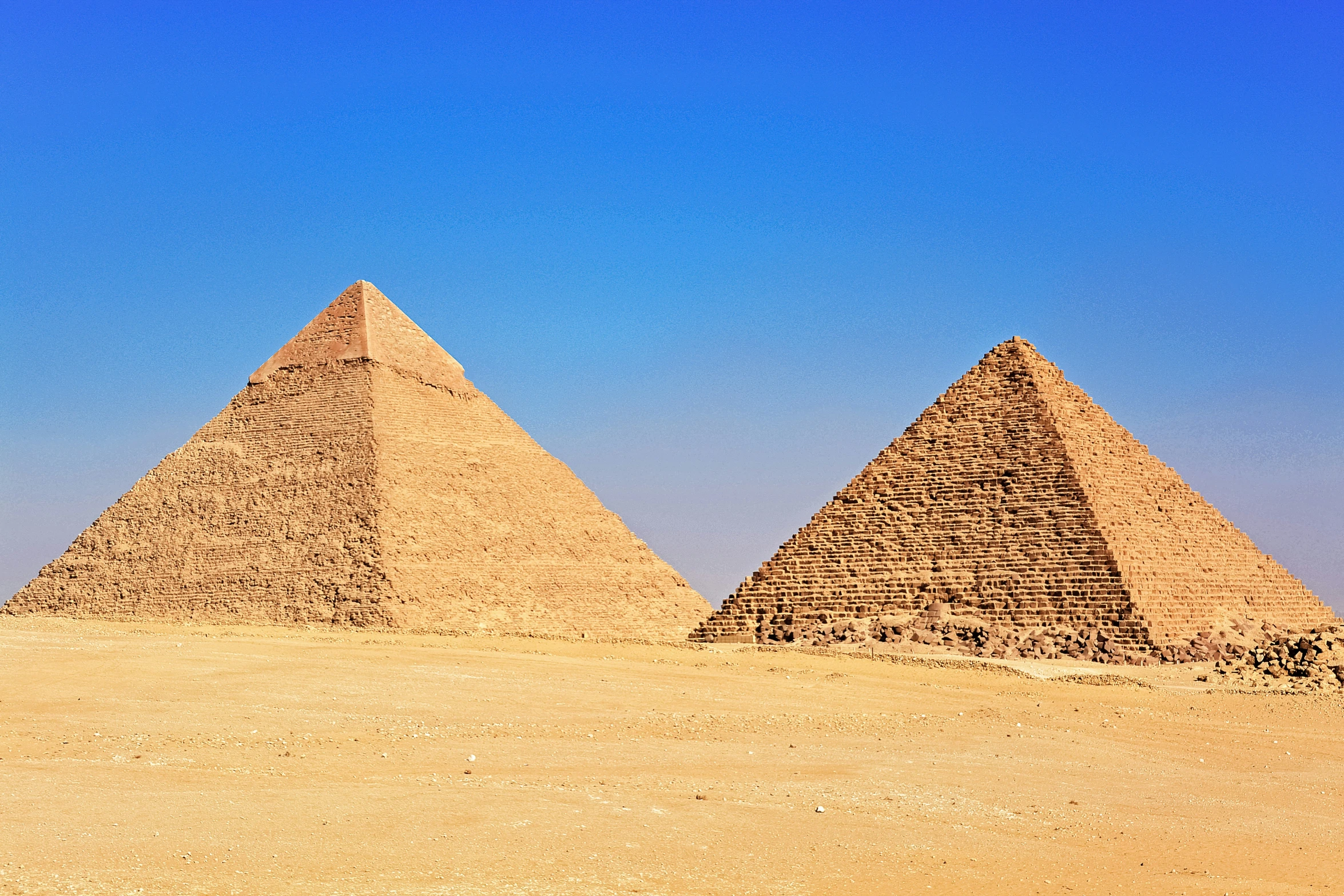 a large group of pyramids in the desert