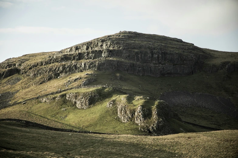 an area that looks very barren, has many rock formations