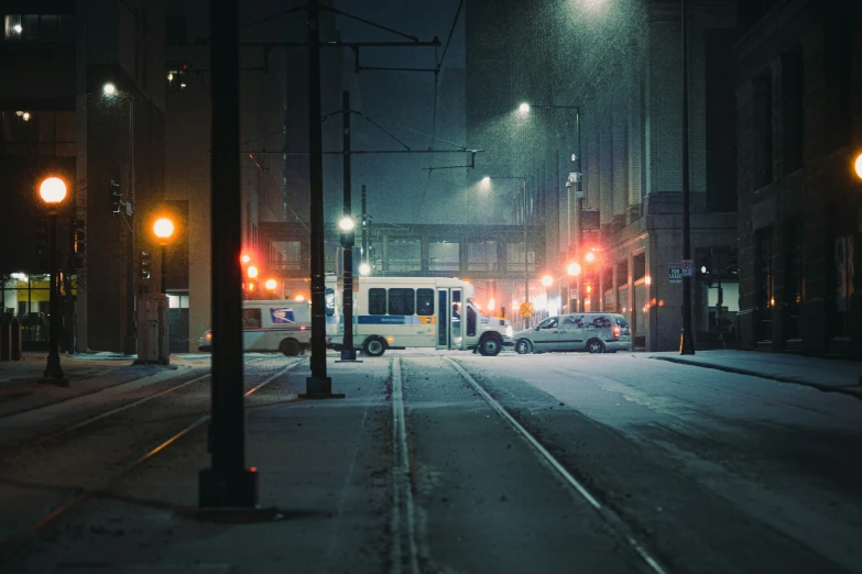 a long road that is lined with traffic lights