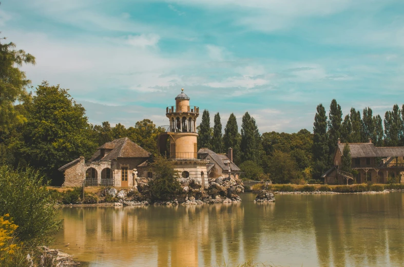 there is a small building with a large tower on it