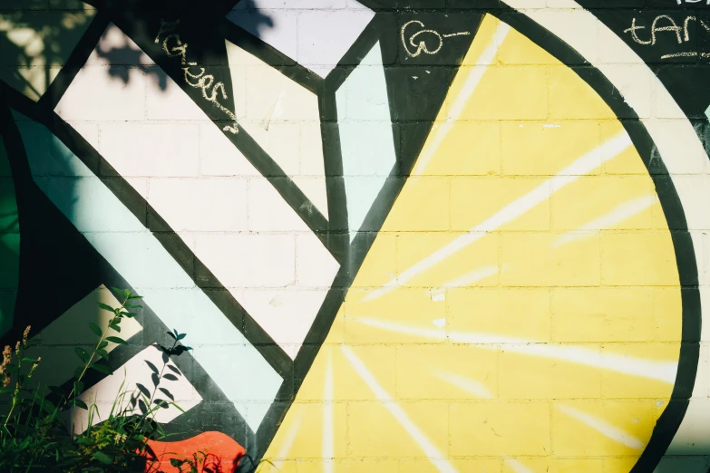 some sort of wall with a very colorful thing in the background