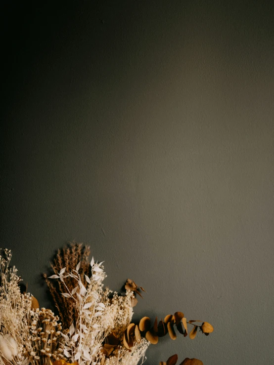 flowers are in a glass vase on the table