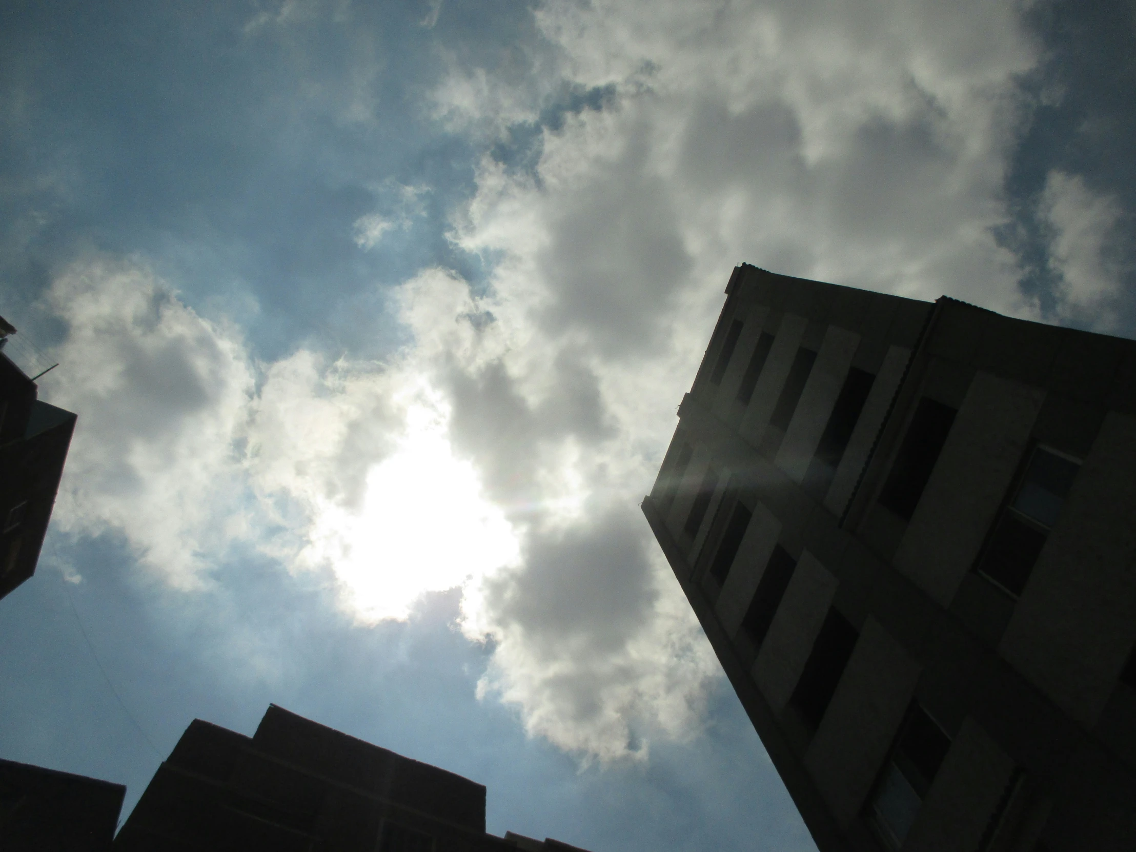 the sky is really blue and the buildings look upward