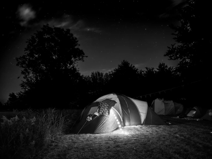 a po of a tent in the dark