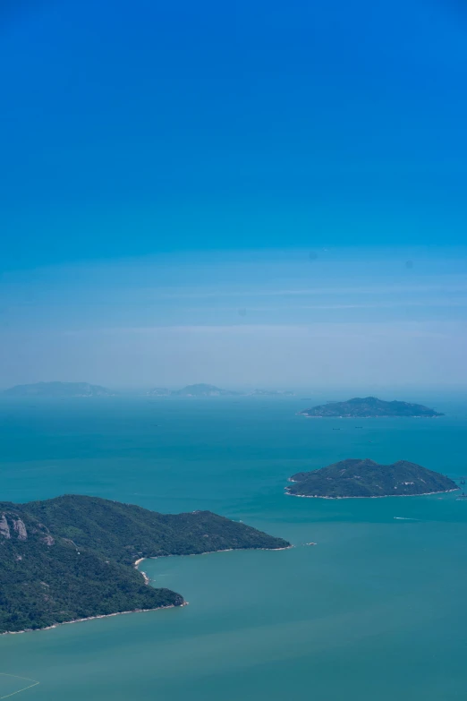 an aerial s of the sea and land beyond