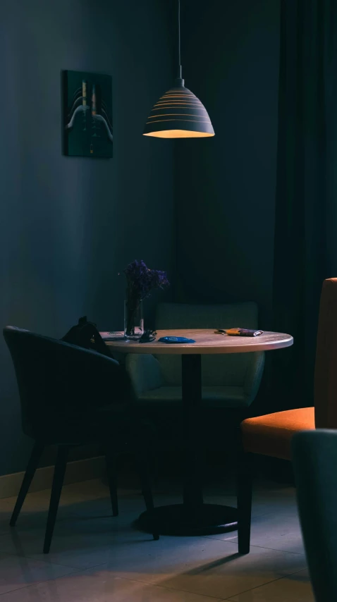 a table is placed between chairs and a couch