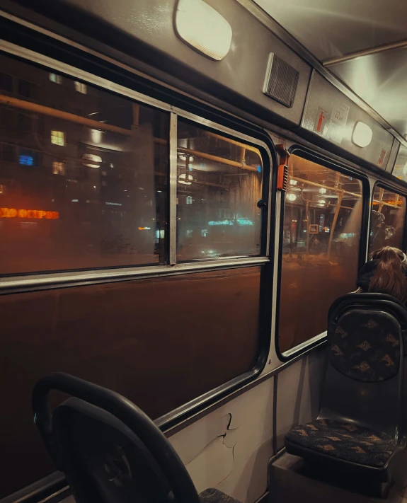 a train car with several seats and lights