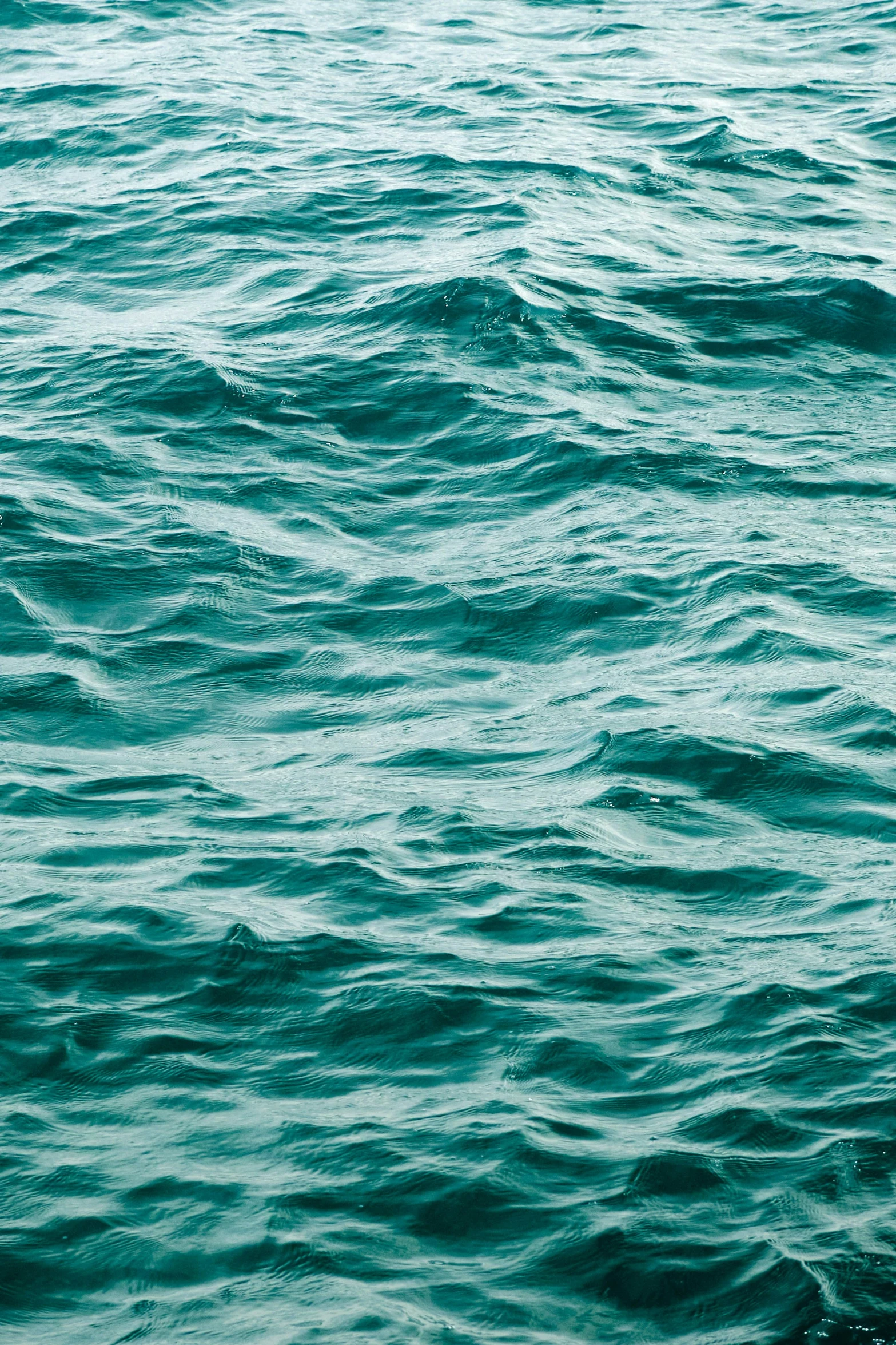 close up view of a blue water surface