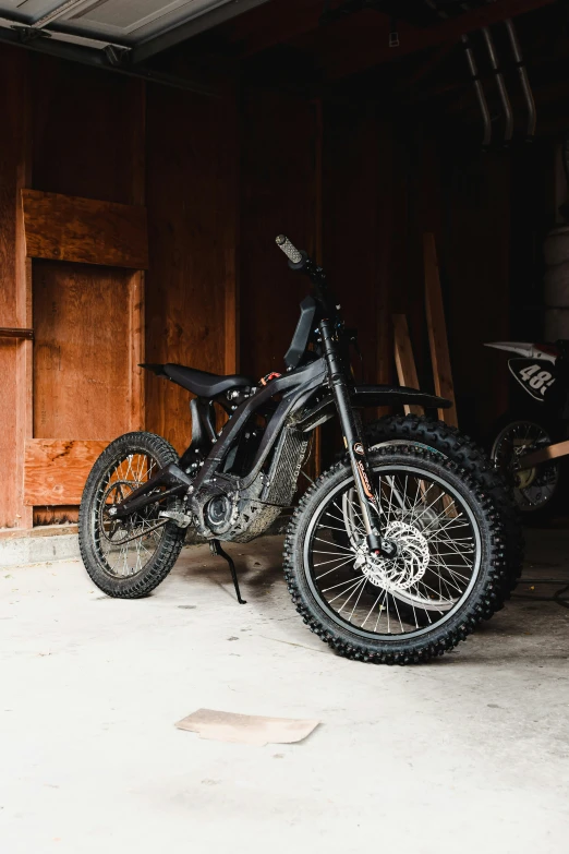 a motorcycle parked inside of a building under construction