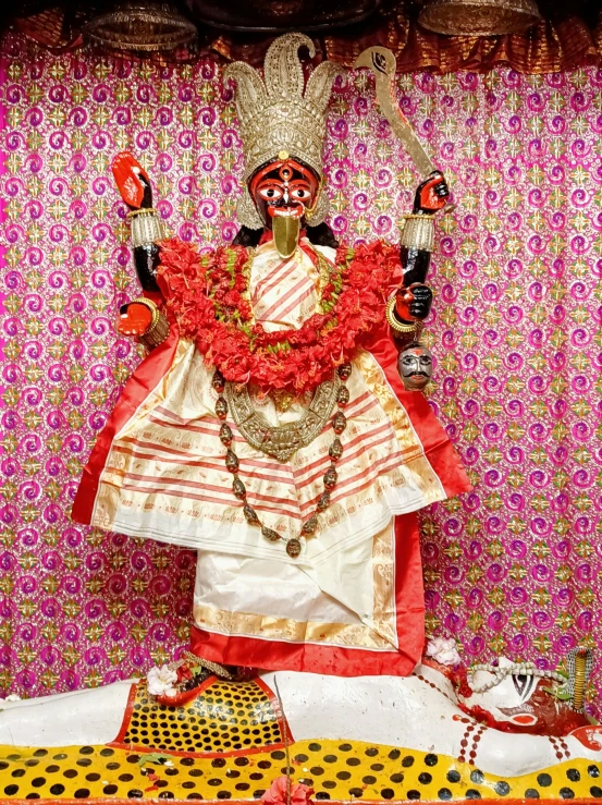 the statue is sitting on a large white platform