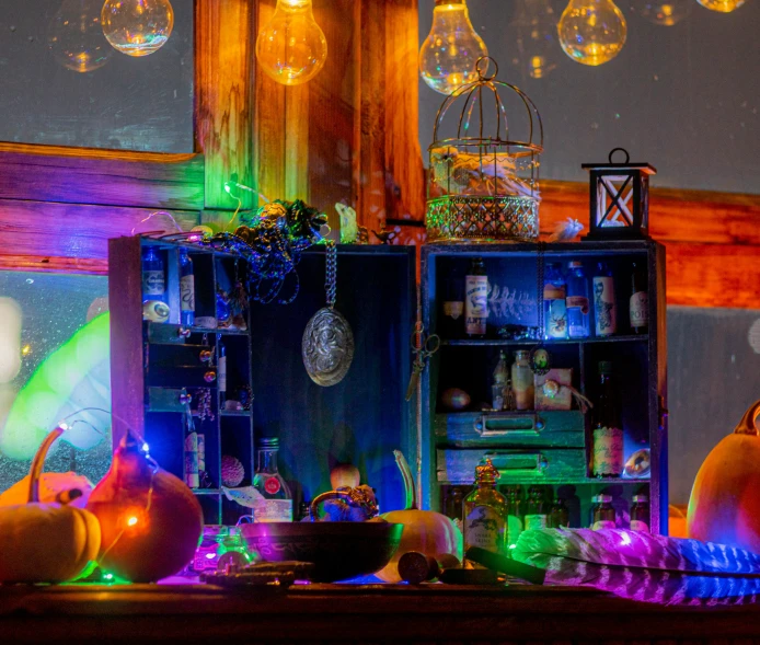 halloween themed kitchen with colorful lights and decorations