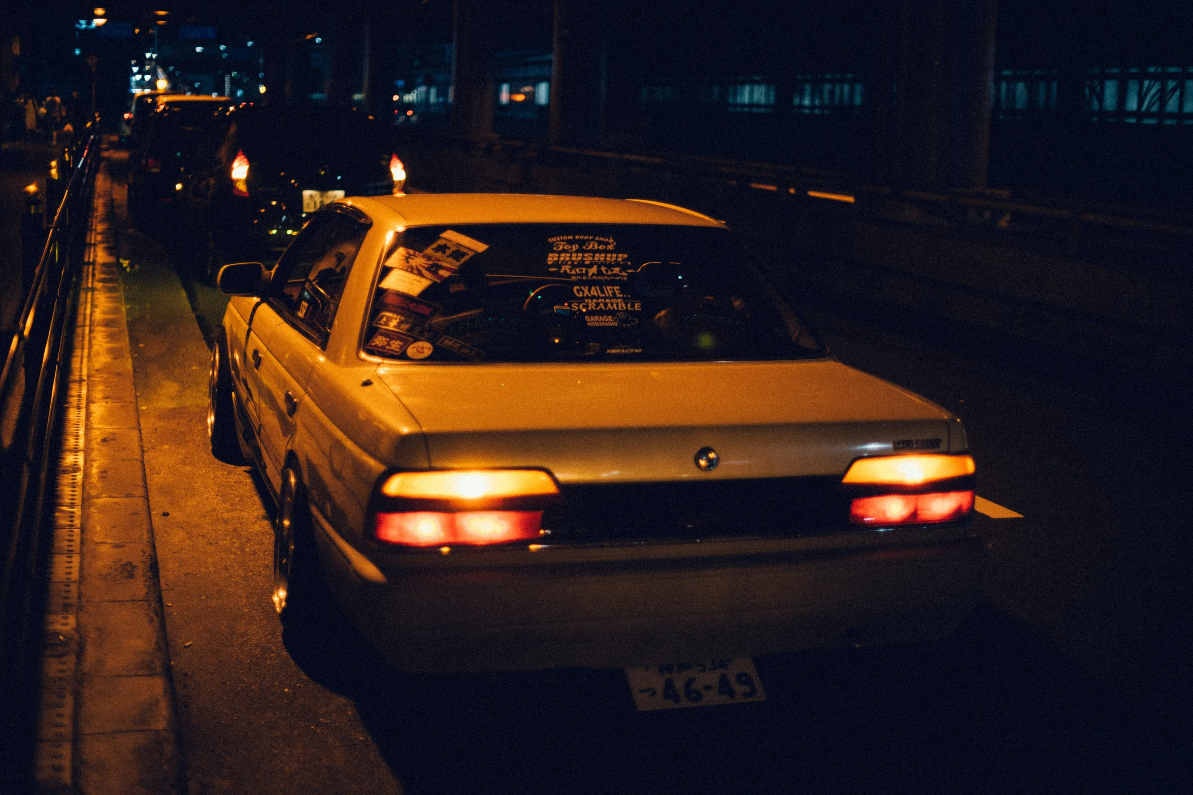 a close up of a car stopped on the street