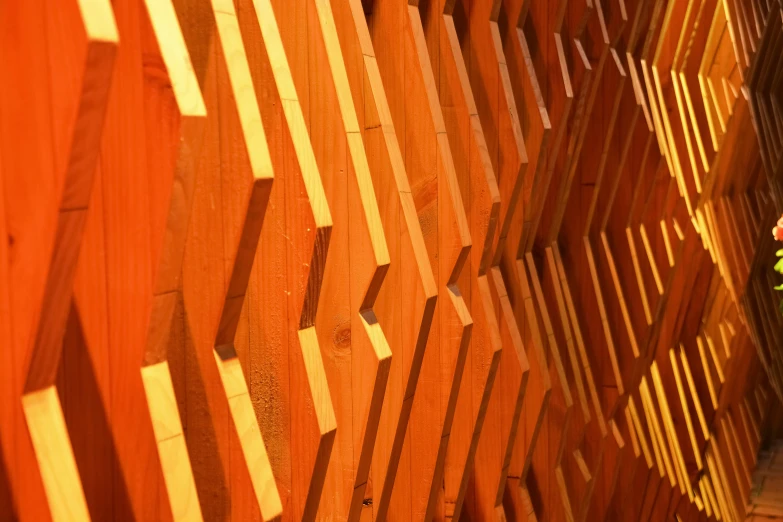 wood slats on a wall and a brick walkway