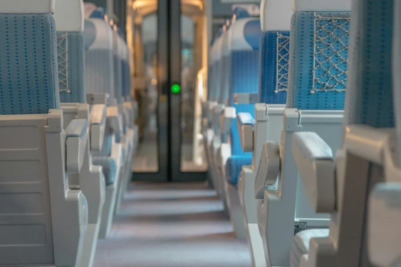 a small corridor on the inside of a plane