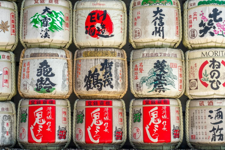 a wall is covered with jars of different varieties