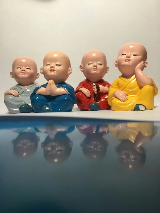 a group of small figurines that are sitting on a table