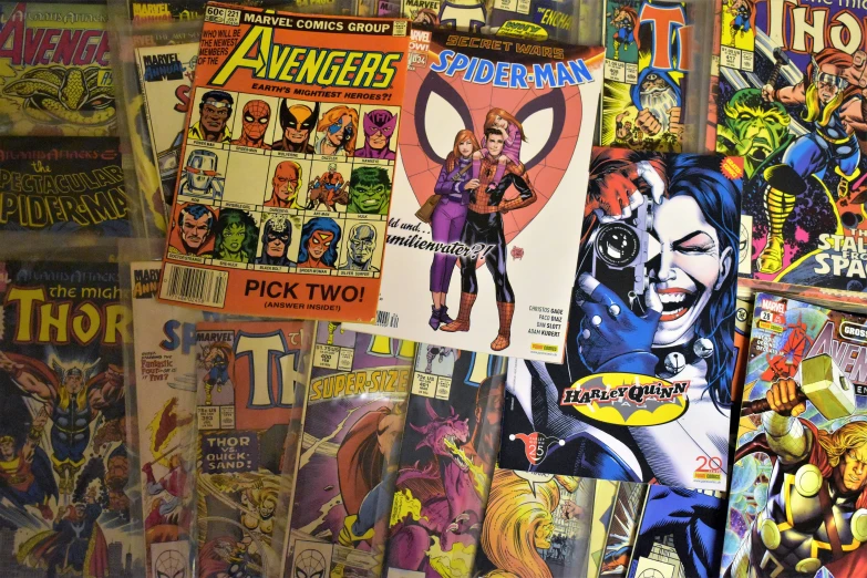 comic books on a wall that has many pages on them