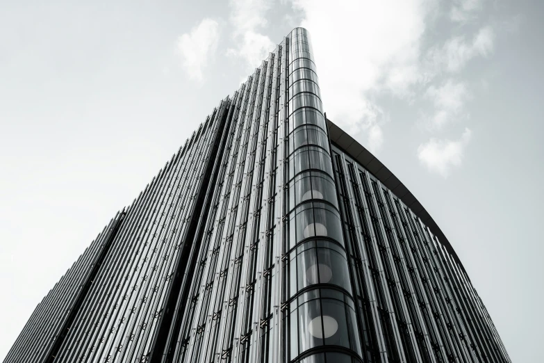 a large building with a bunch of windows on top