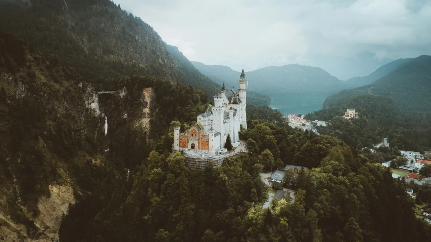 an aerial s of a castle in the mountains