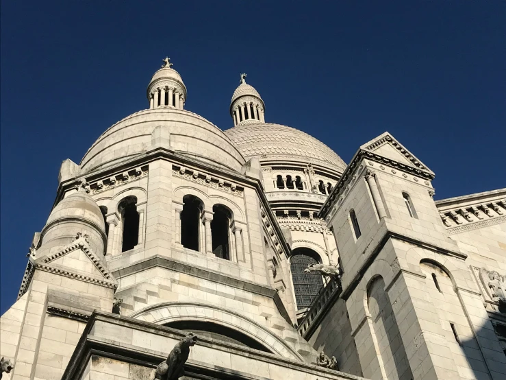 this church has steeple and a cross at the top