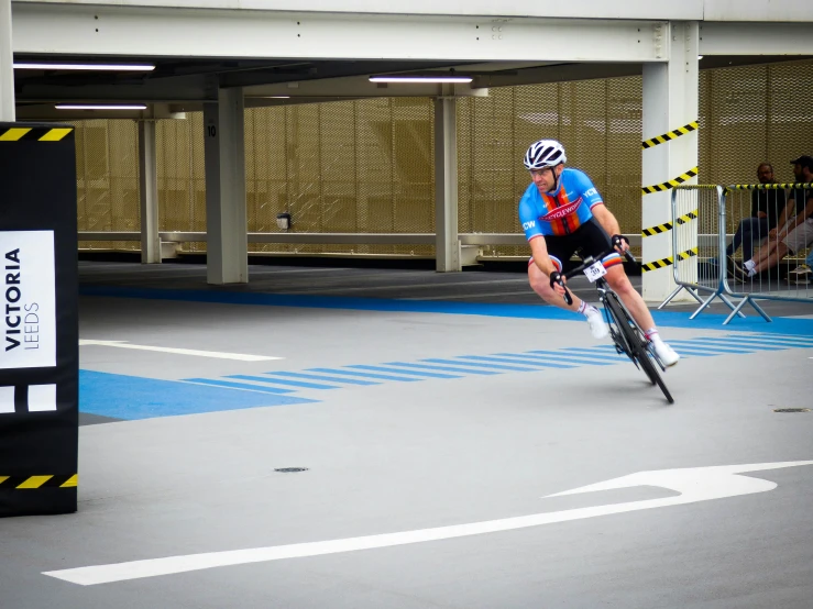 a man riding a bike on a street