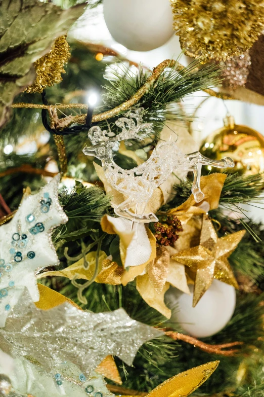 an ornate christmas tree with ornaments