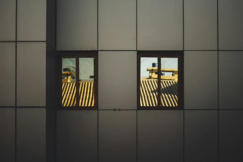 a window with a reflection of a truck in it