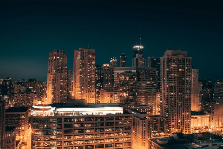 the view from a high rise apartment building in the night