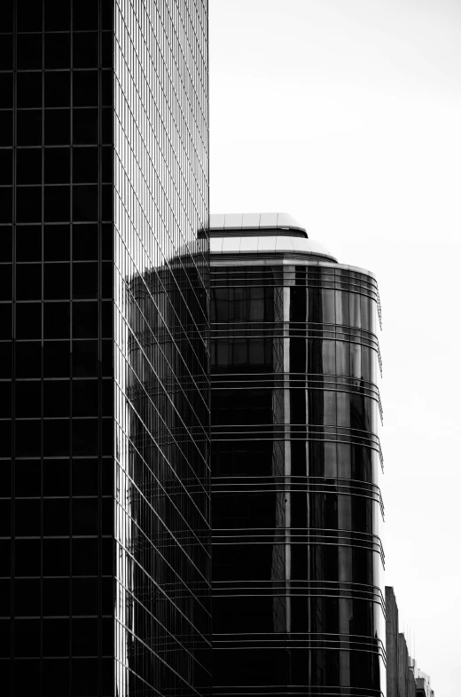 this is an architectural image looking up at some buildings