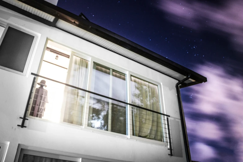 an image of the sky outside of a house