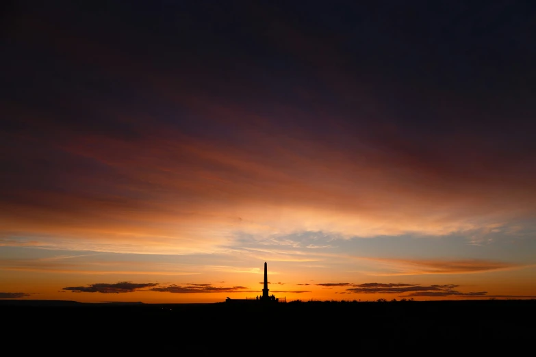 a tall clock tower towering into the sky