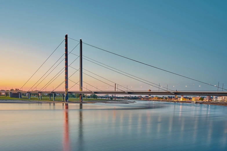 an image of a bridge over some water