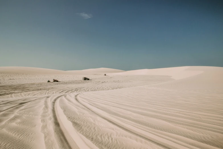 a dirt road on the side of a hill