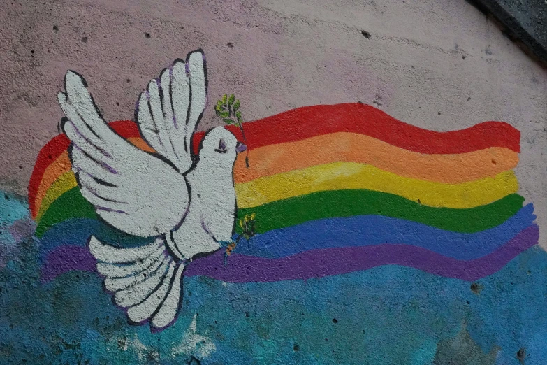 a mural painted with white doves is shown