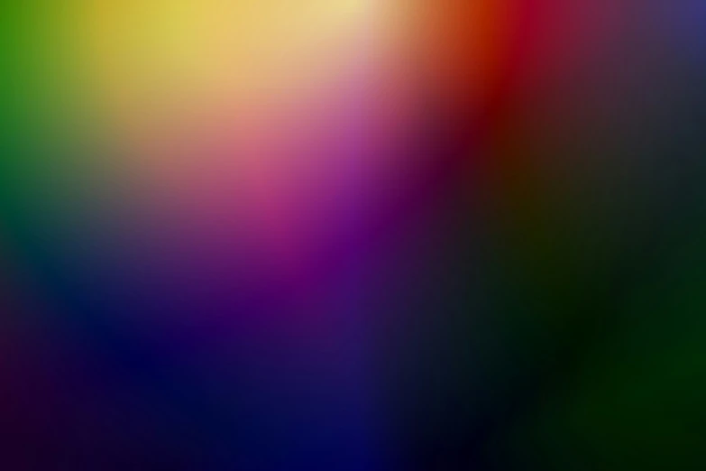 a multicolored background in a very blurry way