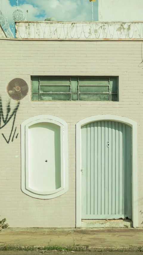 the back entrance to a pink brick building