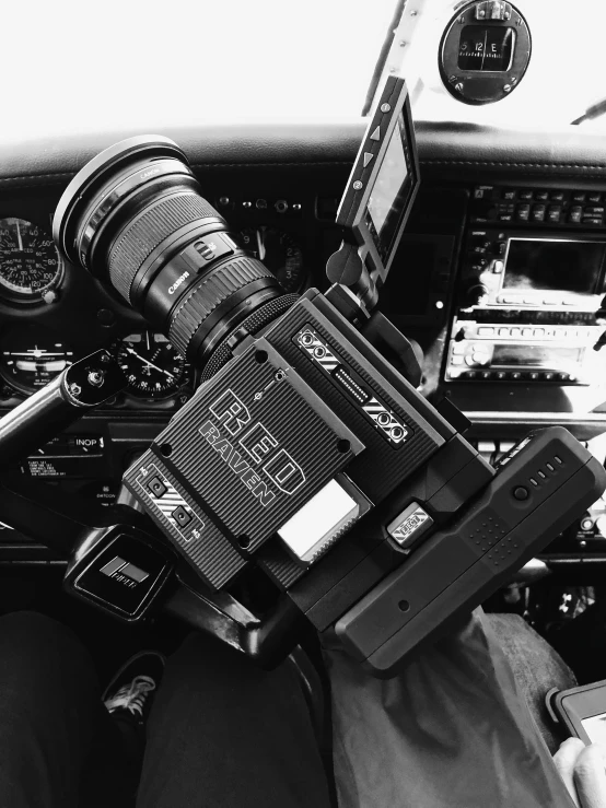 the camera is set up in the center console of a car