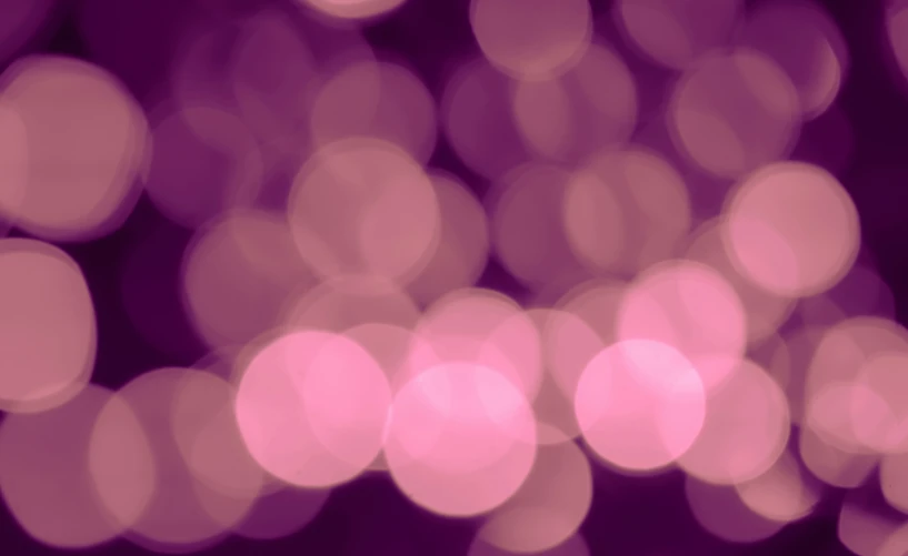 a dark pink and purple po of blurred lights