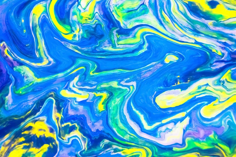 blue, yellow and green paint swirling around