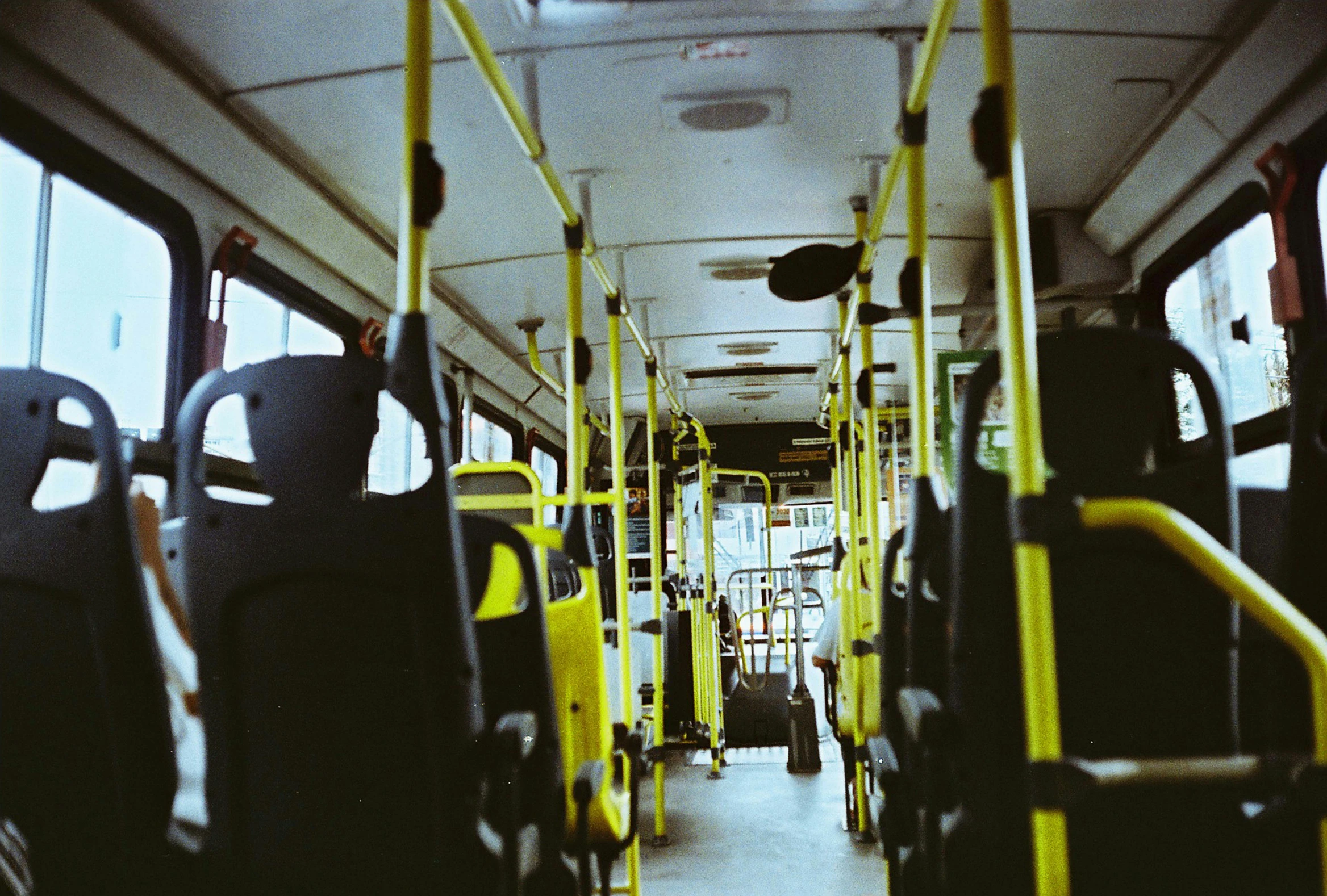 a view of a long row of commuter buses