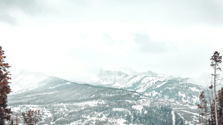 view of the snow covered mountains in the winter