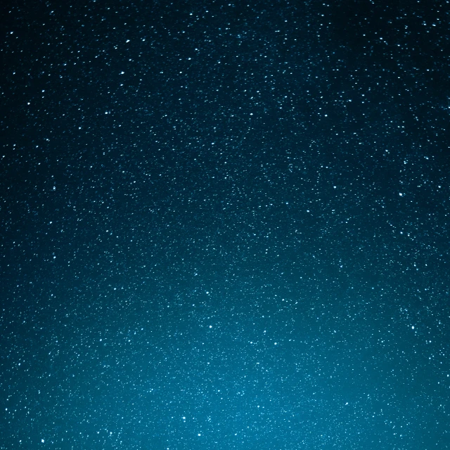 the sky with stars in it at night time