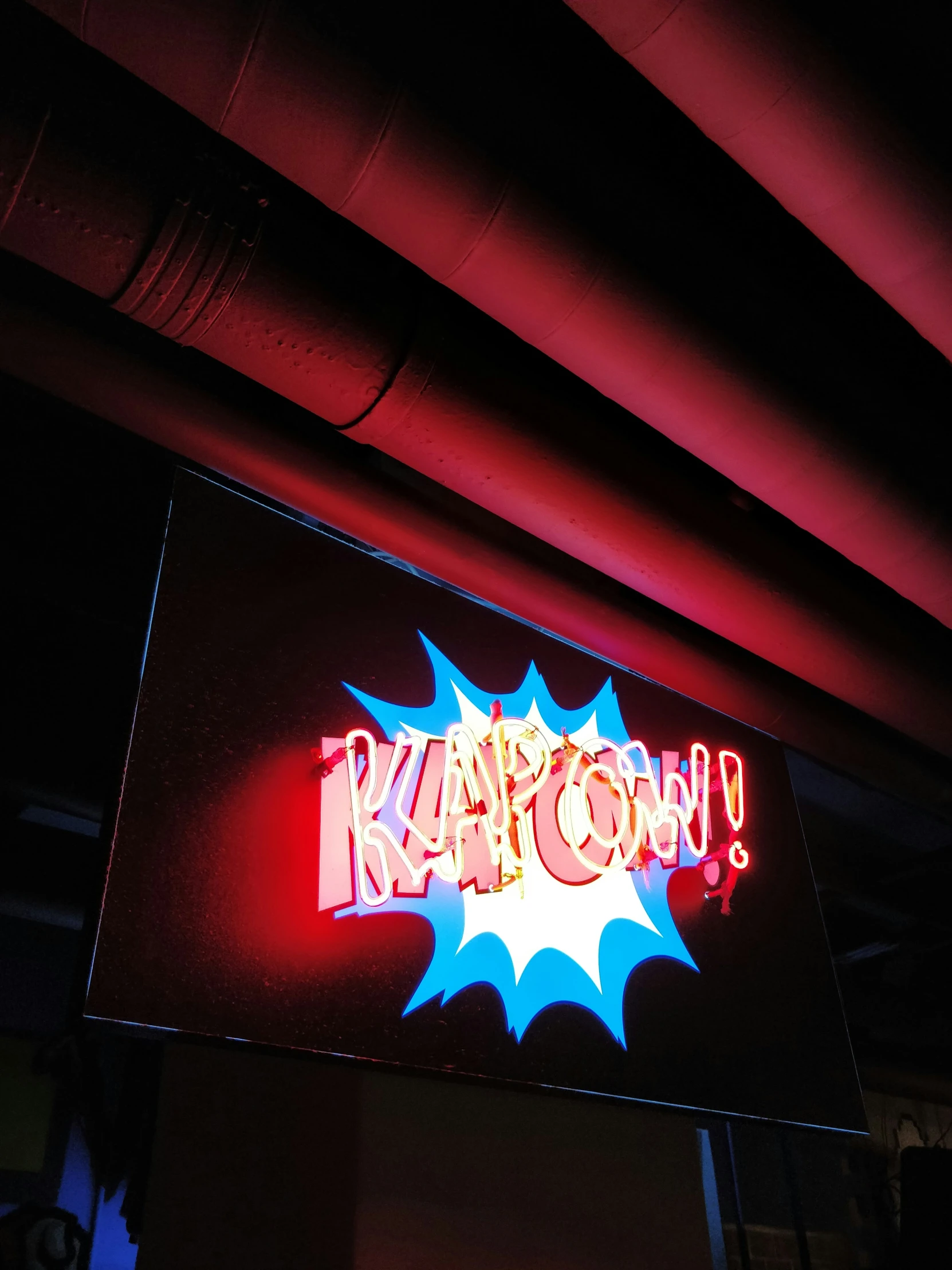 a very colorful neon sign advertising krasowy